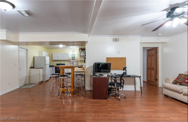 430 Shady Hollow Blvd E, Naples, FL 34120 - office with a ceiling fan, wood finished floors, crown molding, and baseboards