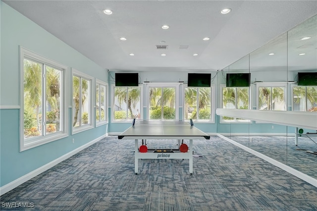 sunroom / solarium featuring visible vents