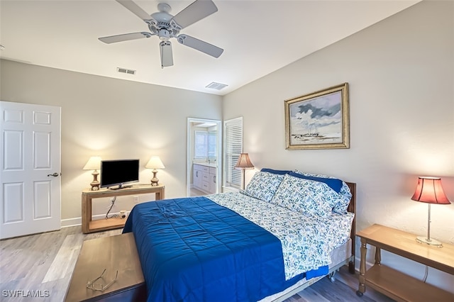 bedroom featuring ceiling fan and wood-type flooring