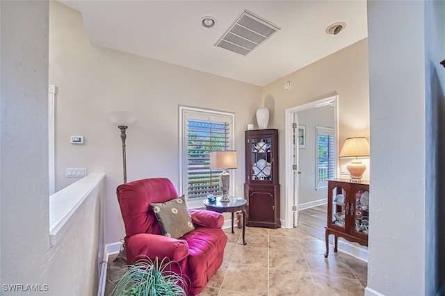 living area with light tile patterned flooring