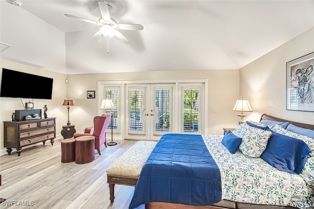 bedroom with access to outside, french doors, hardwood / wood-style floors, vaulted ceiling, and ceiling fan