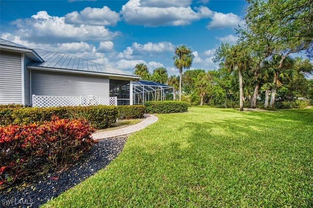 view of yard featuring a lanai