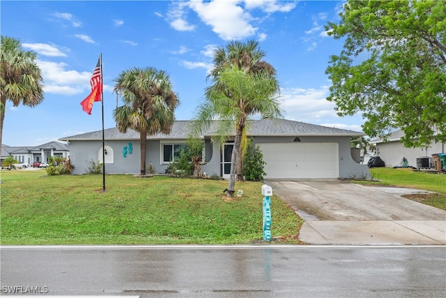 single story home with a front yard and a garage