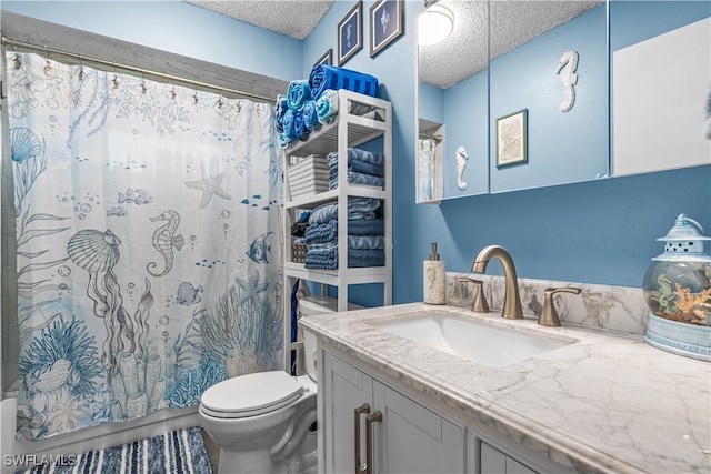 bathroom with vanity, a shower with shower curtain, a textured ceiling, and toilet