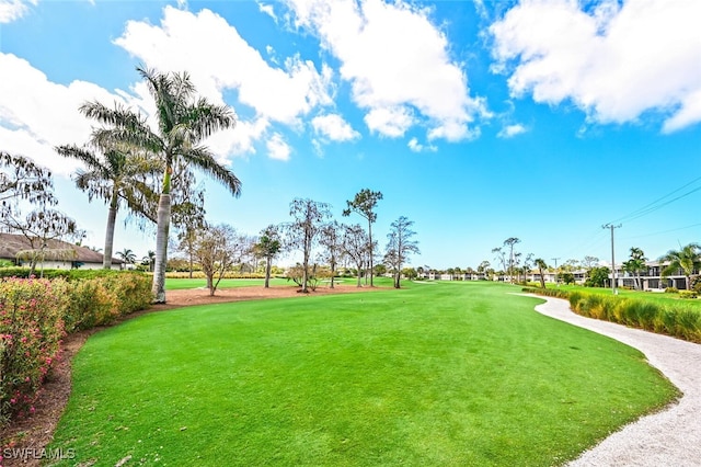 83 Glades Blvd Unit 2Apt 1612, Naples, FL 34112 - view of home's community featuring golf course view, a yard, and a residential view