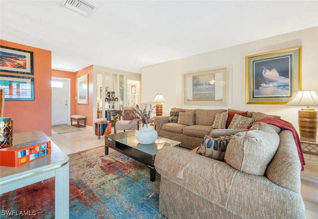 living room with light tile patterned flooring