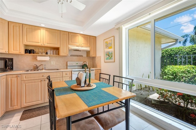 kitchen featuring tasteful backsplash, light tile patterned flooring, electric stove, light brown cabinets, and sink