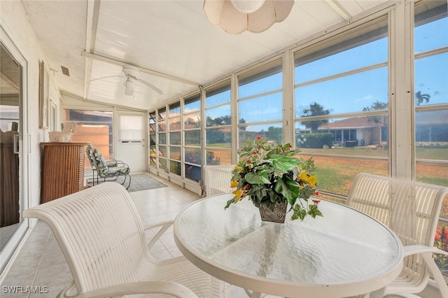 83 Glades Blvd Unit 2Apt 1612, Naples, FL 34112 - sunroom with ceiling fan and outdoor dining area