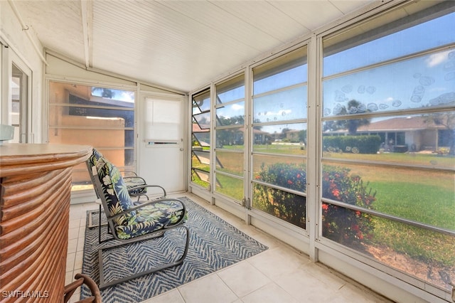 sunroom / solarium with lofted ceiling