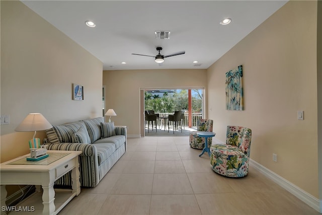 living area featuring recessed lighting, baseboards, visible vents, and light tile patterned flooring