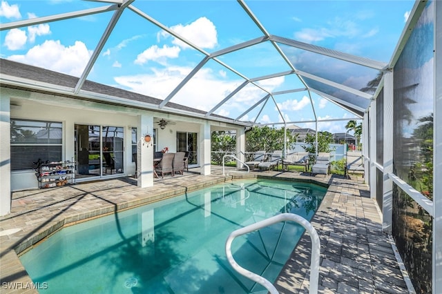 pool featuring a lanai and a patio