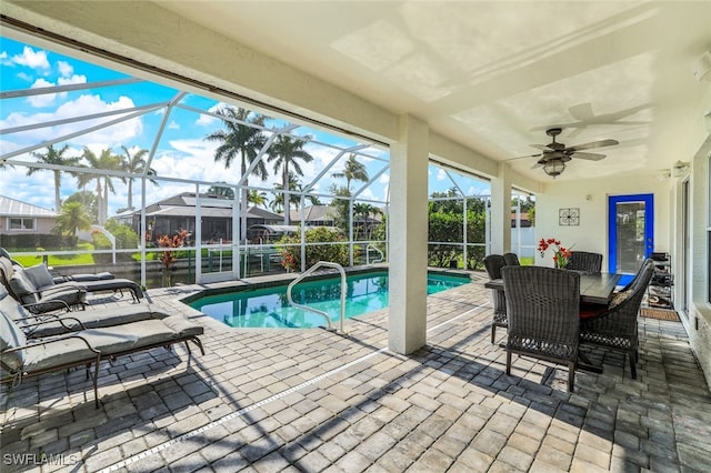 sunroom / solarium with a pool