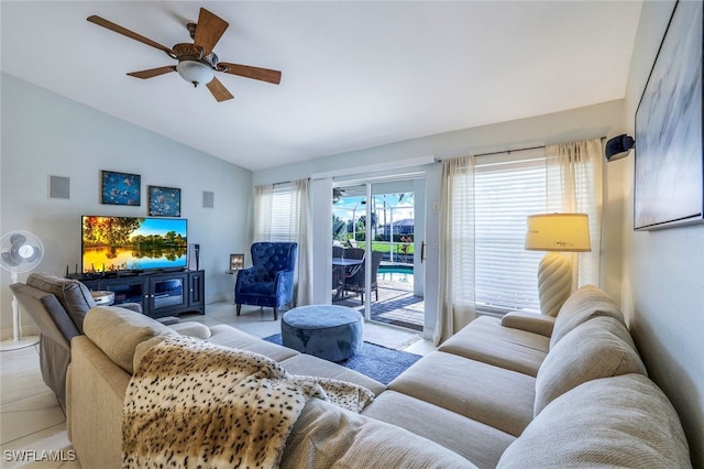 living room featuring vaulted ceiling and ceiling fan