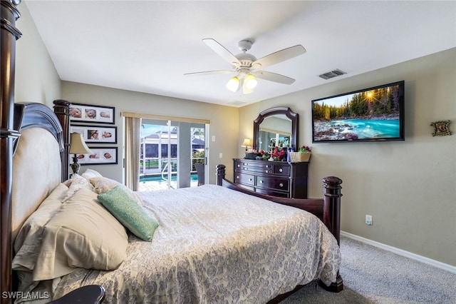 carpeted bedroom featuring baseboards, ceiling fan, visible vents, and access to exterior