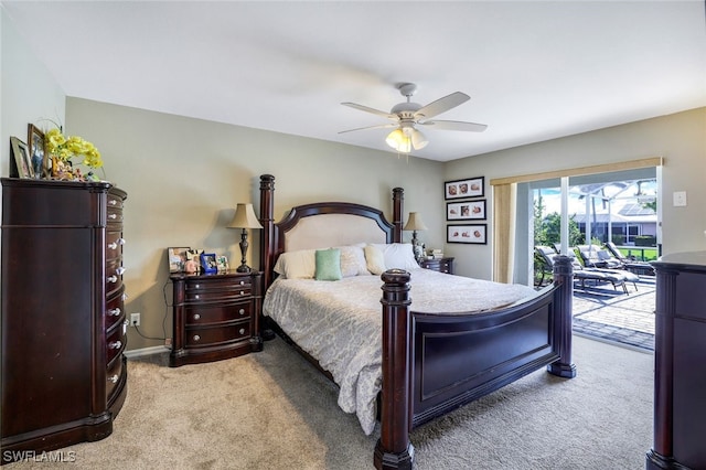 carpeted bedroom featuring ceiling fan and access to outside