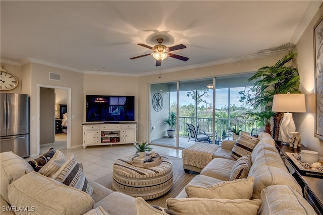 tiled living room with ceiling fan and crown molding