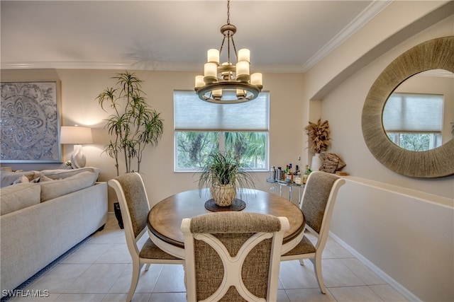 dining room with light tile patterned flooring, a chandelier, and ornamental molding