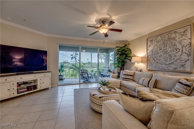 tiled living room with ornamental molding and ceiling fan