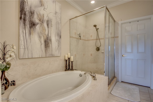 bathroom with independent shower and bath, tile patterned flooring, and ornamental molding