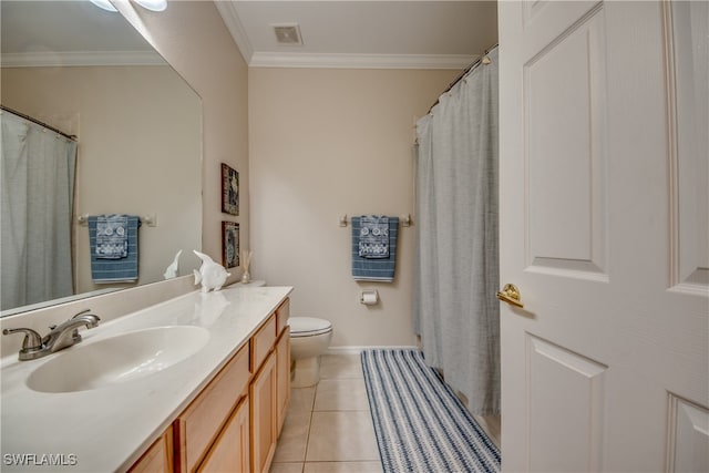 bathroom featuring vanity, tile patterned floors, toilet, and crown molding