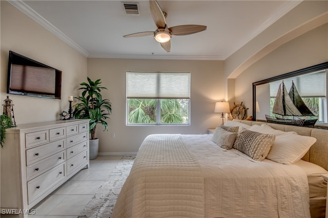 bedroom featuring light tile patterned flooring, ceiling fan, and crown molding