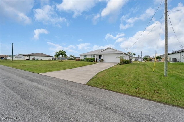 ranch-style home with a front lawn and a garage