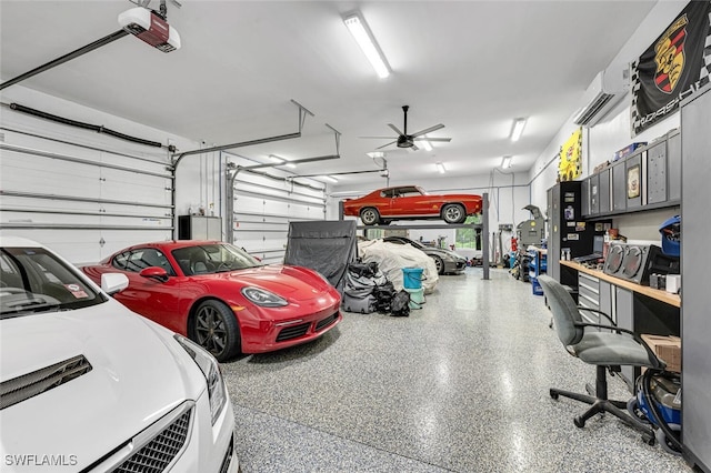 garage with a garage door opener, an AC wall unit, and ceiling fan