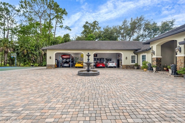 view of patio / terrace featuring a garage