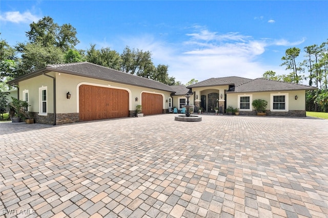 view of front of home with a garage