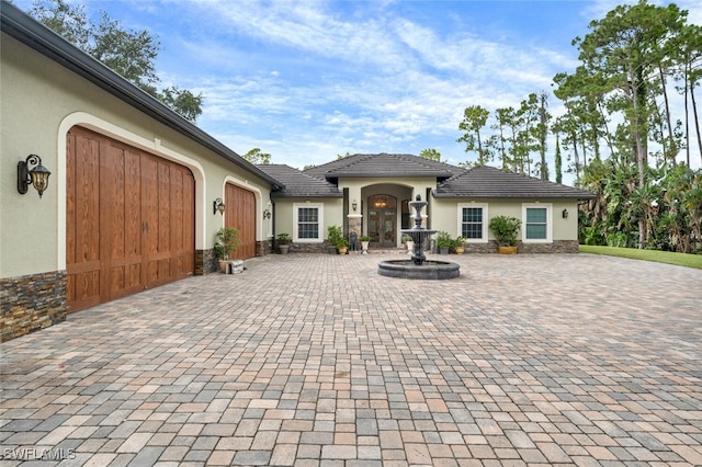 view of front of property featuring a garage