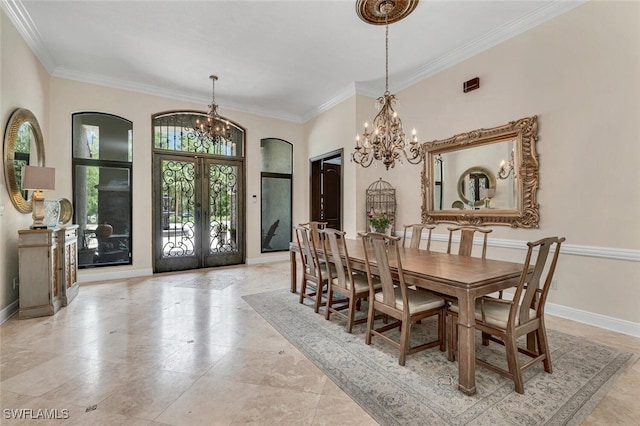 dining room with french doors, an inviting chandelier, and ornamental molding