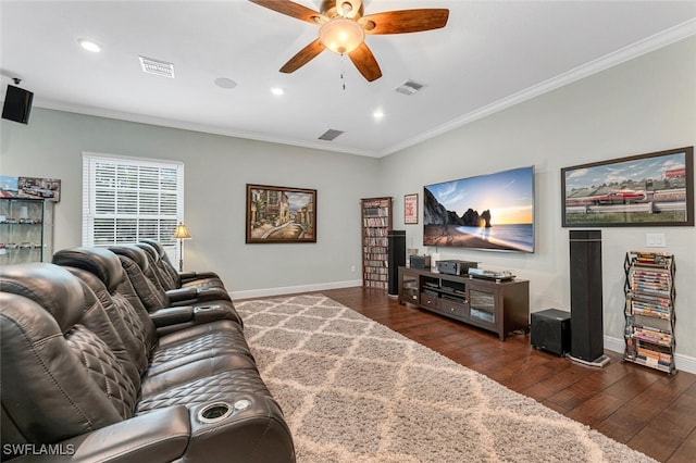 living room featuring dark hardwood / wood-style flooring, ceiling fan, and ornamental molding