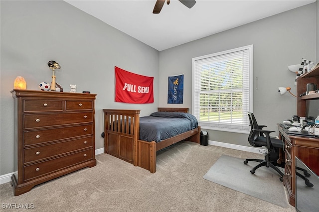 carpeted bedroom featuring ceiling fan