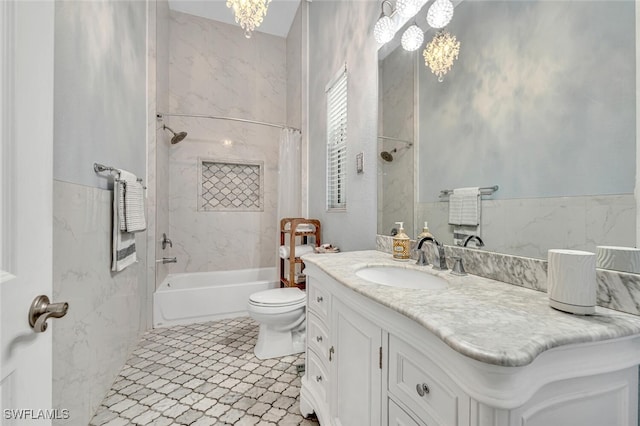 full bathroom with shower / bath combo, a notable chandelier, tile patterned floors, toilet, and vanity