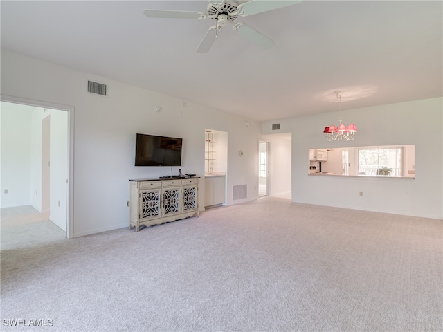 unfurnished living room featuring carpet floors and visible vents