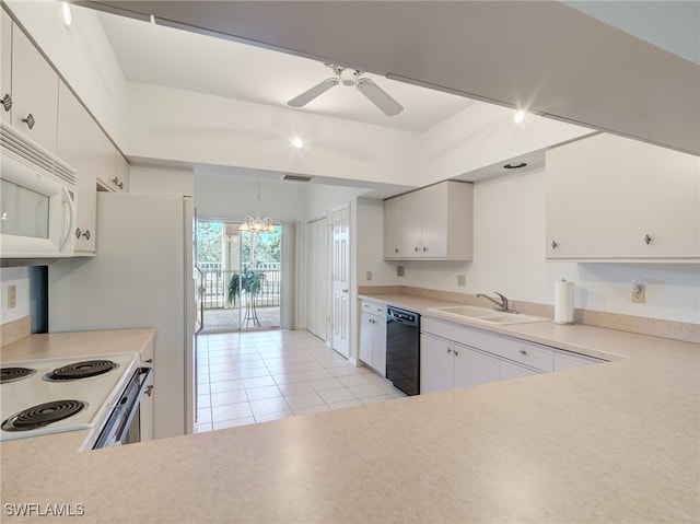 kitchen with white appliances, light tile patterned floors, white cabinets, light countertops, and a sink