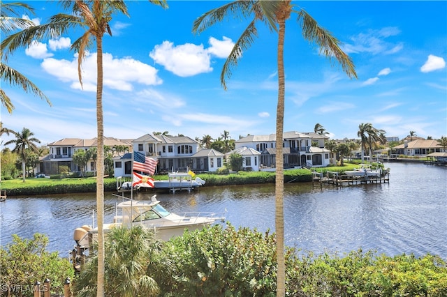 water view featuring a dock