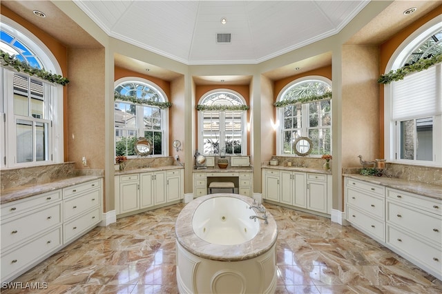 bathroom featuring a tub to relax in, vanity, high vaulted ceiling, and tasteful backsplash