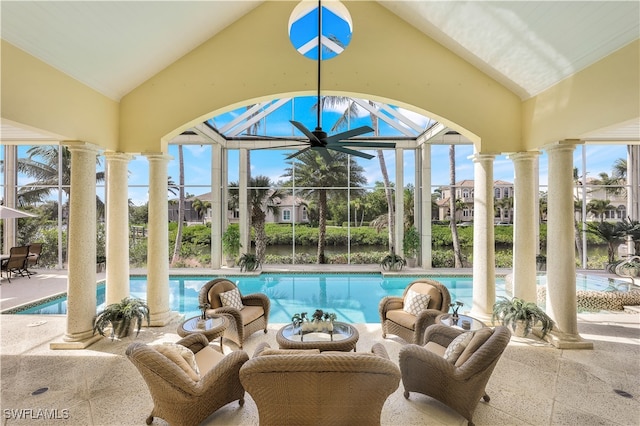 view of pool featuring ornate columns