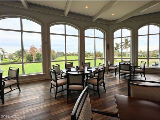 sunroom featuring beamed ceiling