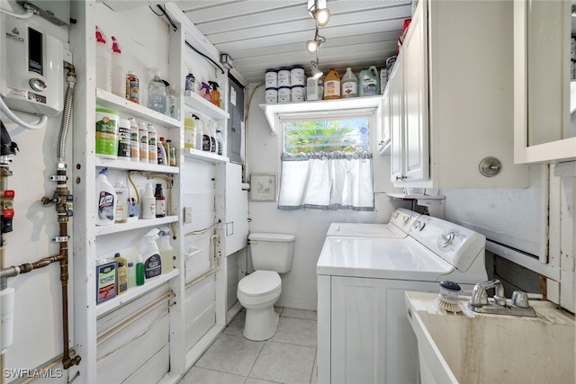 bathroom with tile patterned floors, separate washer and dryer, toilet, and sink