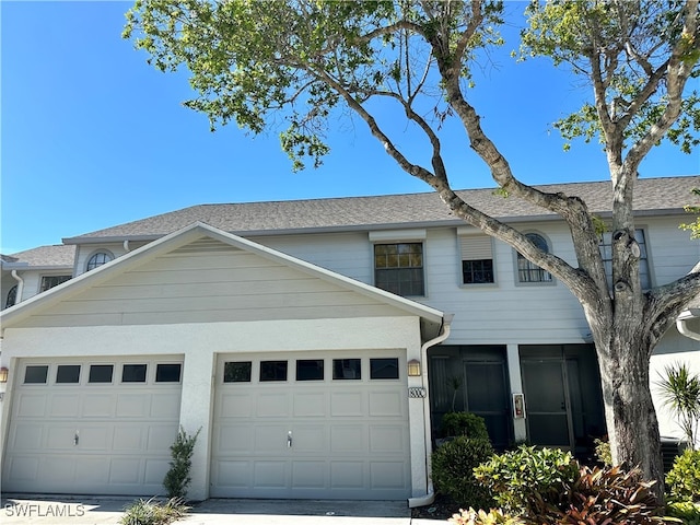 view of front of property with a garage