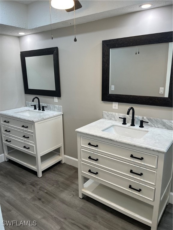 bathroom featuring hardwood / wood-style floors and vanity