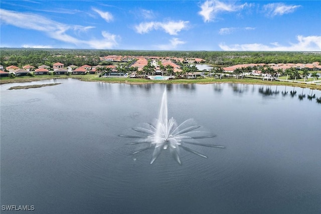 bird's eye view featuring a water view and a residential view