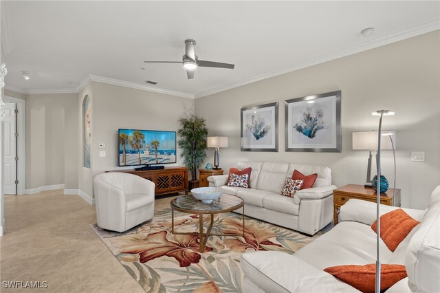 living room with ceiling fan and crown molding