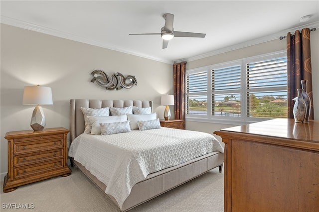 bedroom with ceiling fan, light colored carpet, and ornamental molding