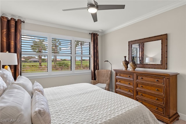 bedroom with ceiling fan and crown molding