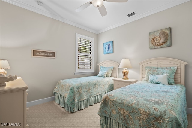 bedroom with carpet, ceiling fan, and crown molding