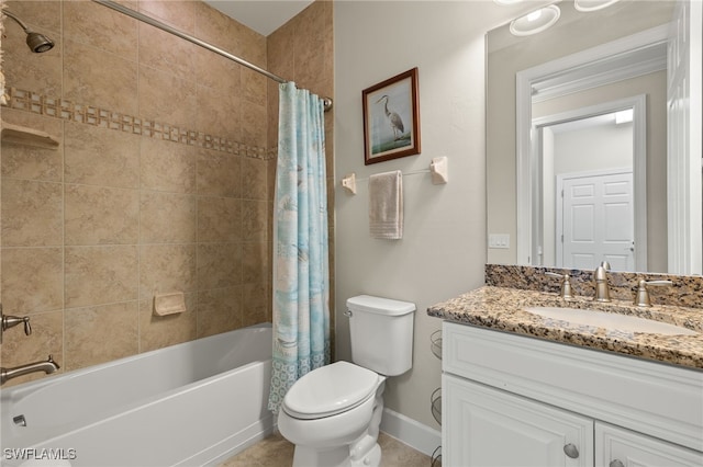 full bathroom with tile patterned floors, vanity, toilet, and shower / bath combo with shower curtain