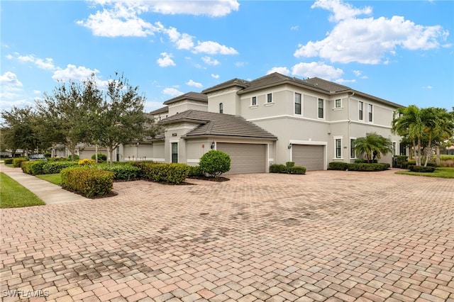 view of front of home with a garage